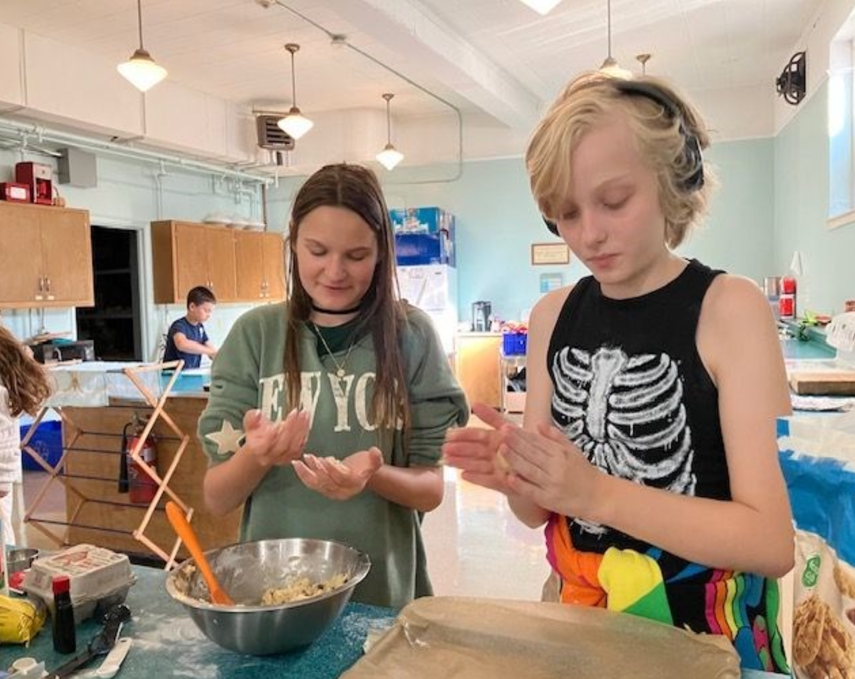 Two kids from Youth Group doing an activity